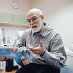 Dental clinic in Albania with dentists performing dental treatment for patients.