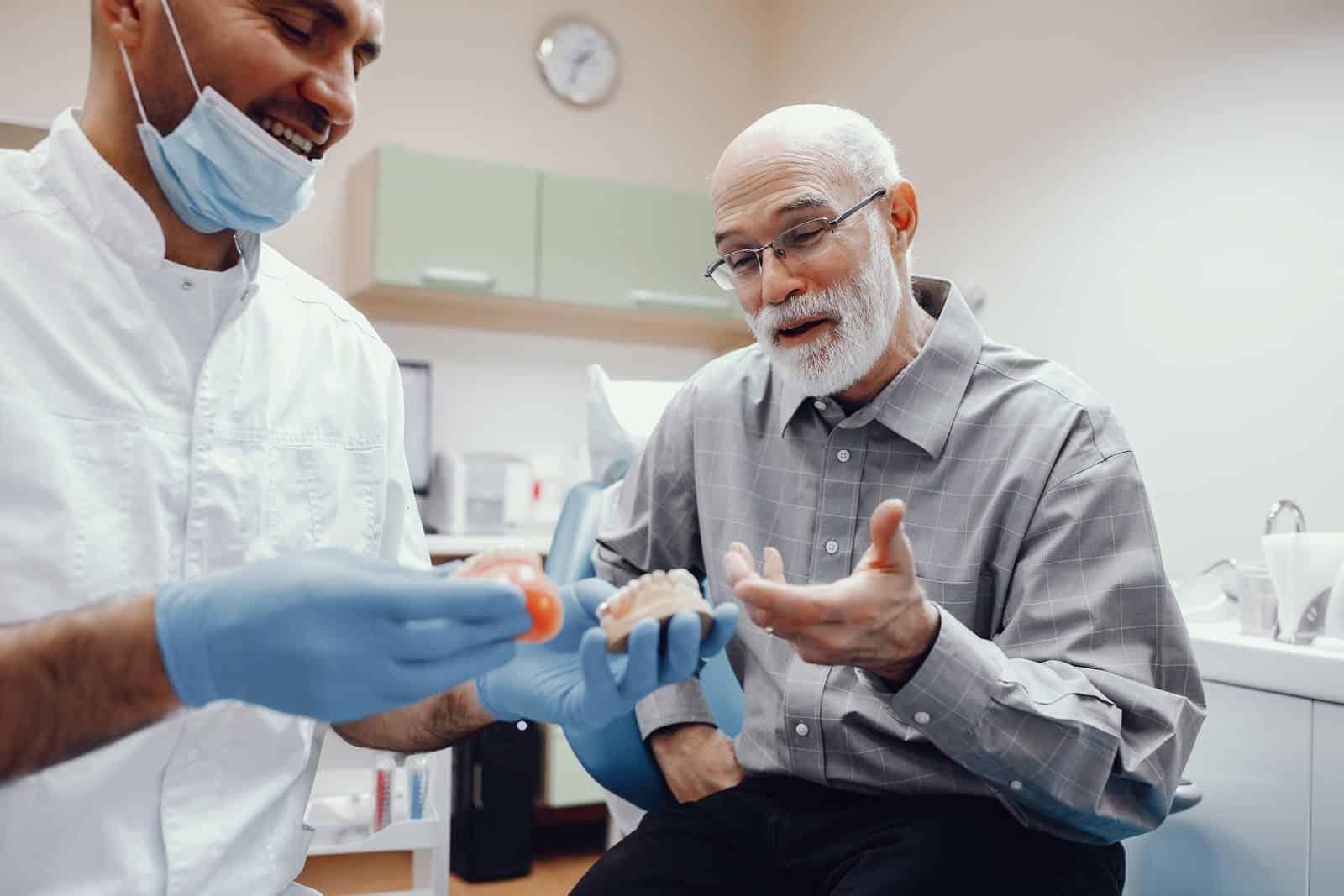 Dental clinic in Albania with dentists performing dental treatment for patients.
